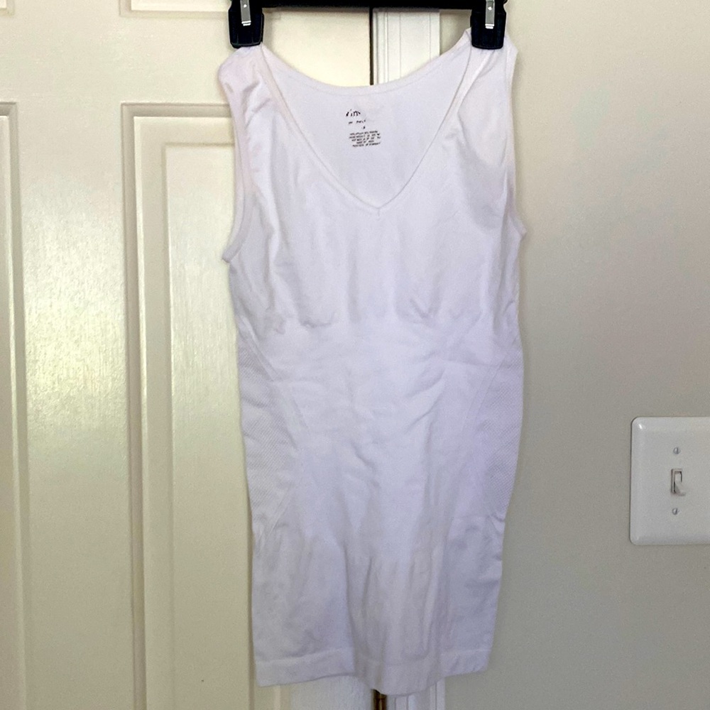 White tank made from spandex with side slimming at waist